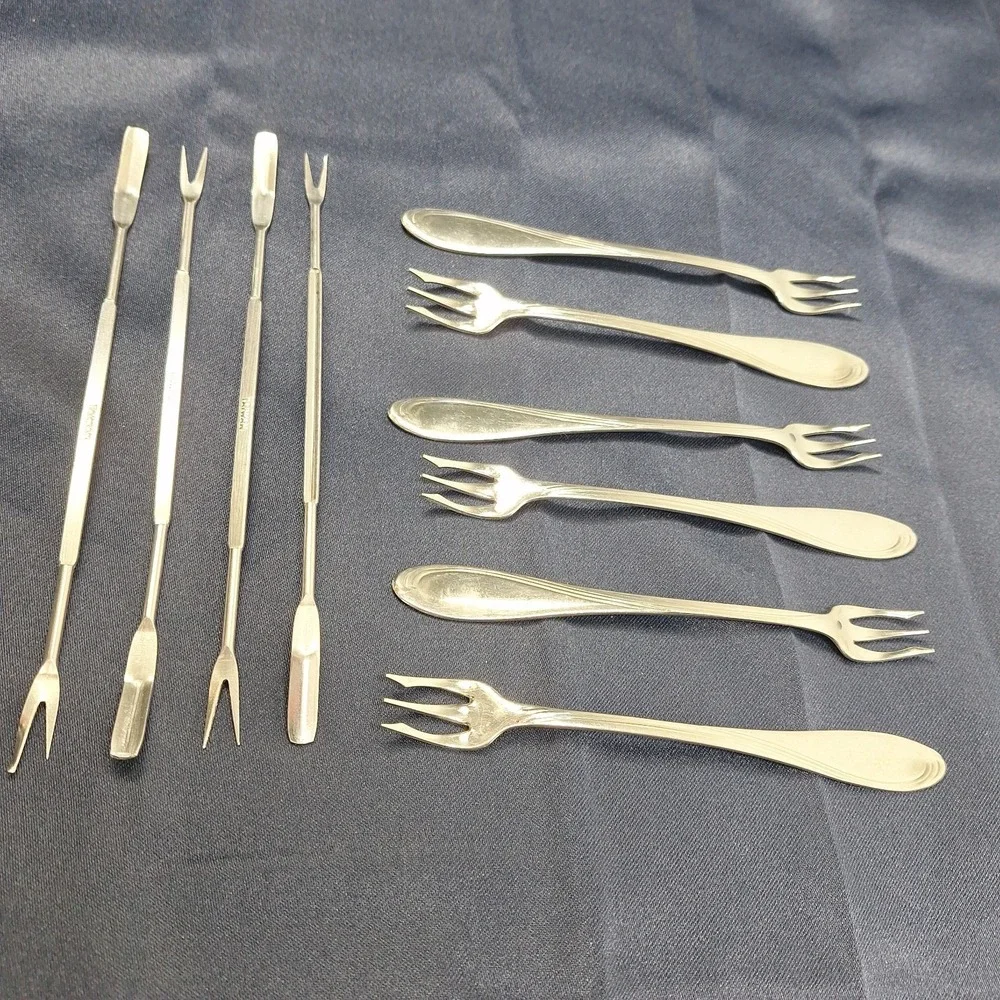 6 Oneida Silver Stainless Camber Cresta Windswept Scroll Cocktail Forks + 4 read
